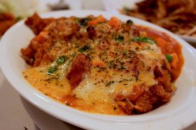 Asian Fusion Cafe serves Hong Kong-style diner classics including deep-fried pork chops with rice and mozzarella cheese.